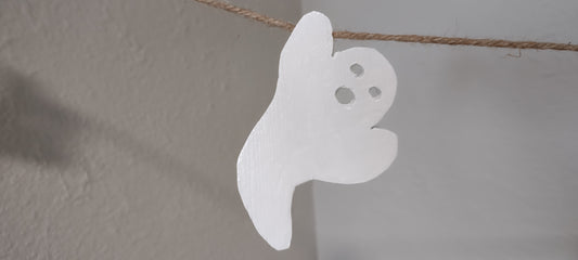 White, wooden Halloween ghost. 